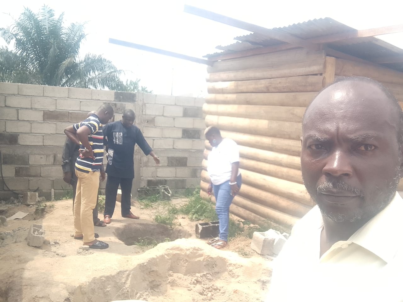 President Rev. Tah and NEC members inspecting the construction site